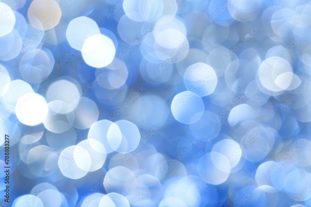 Poster abstract blue light bokeh background with blurred defocused effect for artistic design