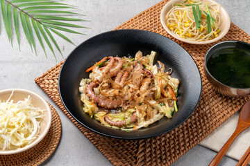 Korean food, octopus, stir-fry, side dishes, bean sprouts, soy sauce, spicy, chili powder, seaweed soup, cabbage, perilla leaf, bossam,