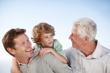 Grandfather, father and child by blue sky with smile for bonding, relationship and relax together....