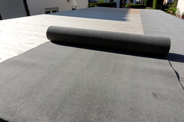 Black bituminous waterproofing for the new roof