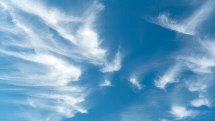 Blue sky with white clouds. Fluffy cloud in the blue sky background