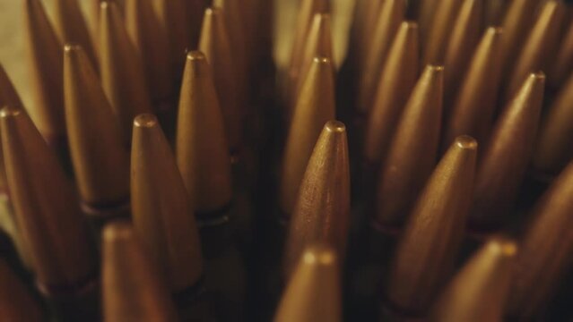 Dense Cluster of Brass Bullet Tips Macro Shot