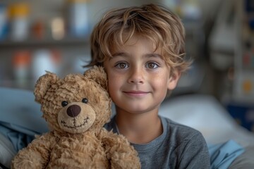 A young boy is shown with a cheerful expression, holding a teddy bear and looking at the camera