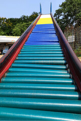 Colorful Rollers on Slide in Park
