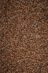 Brown sand background. Textured sand surface.