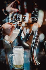 A lively bartender skillfully pouring frothy beer into a mug in an ambient-lit bar, capturing the essence of social gatherings
