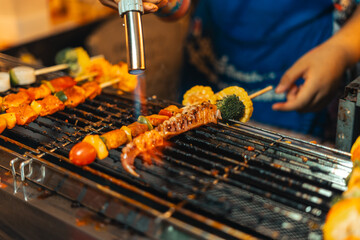 Seafood barbecue skewers for sale at street food