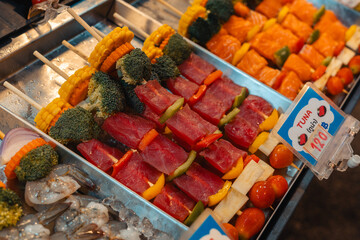 Seafood barbecue skewers for sale at street food