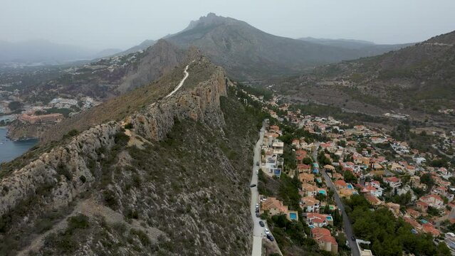 Drone is flying along Mirador Morro de Toix, near Calpe, stunning viewpoint, 4k