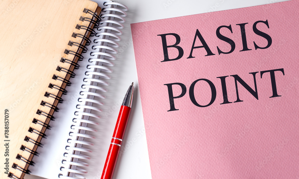 Poster basis point text on pink paper with notebooks