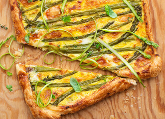 Asparagus pie or tart with eggs, cheese and aromatic herbs, spring Easter recipes. French healthy cuisine, Provencal herbs. Spring asparagus - 788163069