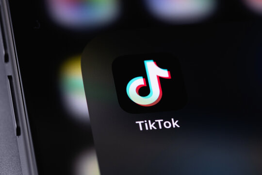 TikTok mobile icon app on screen closeup smartphone iPhone. TikTok is app to create and share videos. Moscow, Russia - December 21, 2023