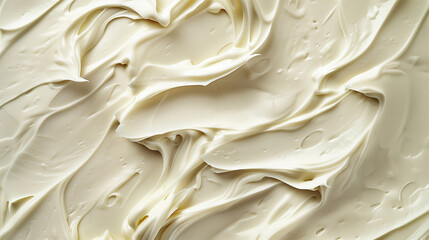A detailed top-view photograph captures the luscious texture and richness of cream, highlighting its intricate details. This close-up image invites viewers to appreciate the smoothness and indulgence  - obrazy, fototapety, plakaty