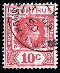 Ukraine, Kiyiv - February 3, 2024.A stamp printed in MAURITIUS shows image of the King George VI , circa 1940.Philately.