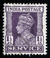 Ukraine, Kiyiv - February 3, 2024.A post stamp printed in India shows portrait of George VI (1895 -1952). Philately.