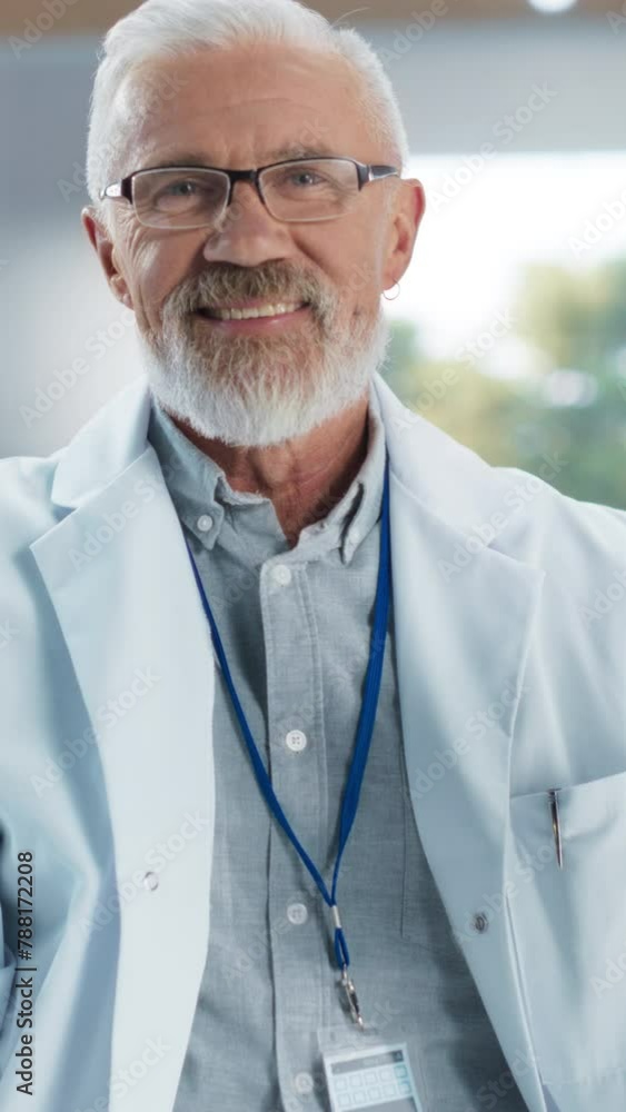 Poster Vertical Screen: Middle Aged Genetic Research Scientist Using a Microscope in an Applied Science Laboratory. Portrait of a Handsome Senior Lab Engineer in White Coat Looking at Camera and Smiling