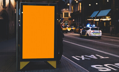 Advertising Outdoor City Light Poster on Blank Vertical Billboard in the City