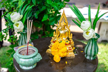 Background of Buddha statues used in the Buddha bathing ceremony on Songkran Day or making merit at...