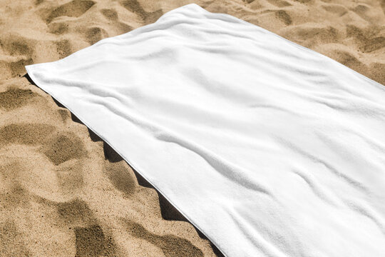 Png beach towel transparent mockup on the beach