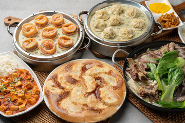 Korean food, shrimp, meat, dumplings, kimchi, xiaolongbao, mapa tofu rice, ribs, octopus, hot pot, side dishes, pickled radish