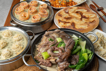 Korean food, shrimp, meat, dumplings, kimchi, xiaolongbao, mapa tofu rice, ribs, octopus, hot pot, side dishes, pickled radish