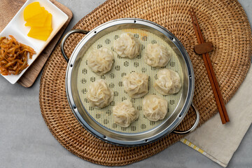 Korean food, shrimp, meat, dumplings, kimchi, xiaolongbao, mapa tofu rice, ribs, octopus, hot pot, side dishes, pickled radish