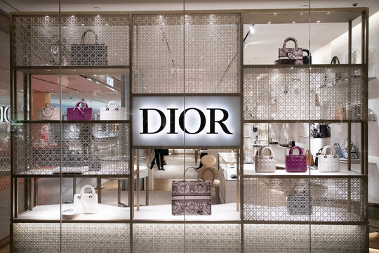 PARIS, FRANCE - MARCH 30, 2024: Facade of the Dior store in Paris. Dior is a French company founded by designer Christian Dior, which designs and retails luxury goods .