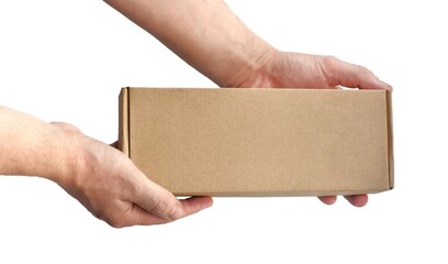 One rectangular cardboard box in hands on a plain light background. No recognizable people
