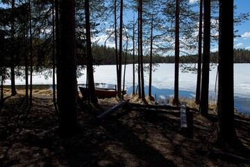 Campsite at Kirkasvetinen lake in spring, Hossa National Park, Suomussalmi, Finland.