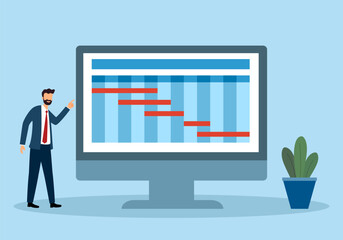 Project manager working on managing projects on computer screen.