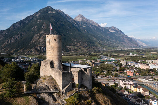 Martigny, Switzerland: Aerial view of the B&acirc;tiaz medieval fort overlooking Martigny city in Canton Valais in the Swiss alps.