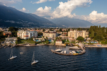 Ascona, Switzerland: Aerial view of Ascona waterfont by lake Maggiore with a small marina  and...