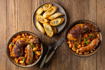 A traditional French one-pot dish with beans, chicken and white sausage. Cassoulet. - 788207488