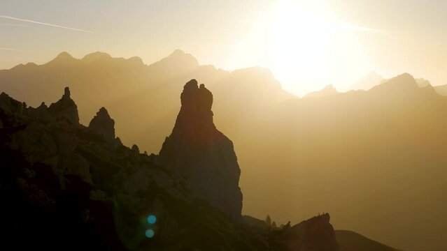 Aerial view of Dolomites at sunset with Pizes de Cir, Trentino, Italy.