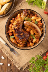 A traditional French one-pot dish with beans, chicken and white sausage. Cassoulet.