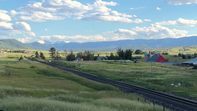 Scenic Views: Farm Land and Mountains in Colorado