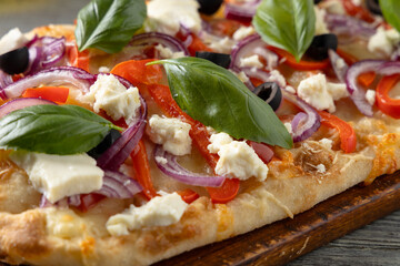 Traditional Roman pinsa with feta cheese, peppers and black olives. - 788210413