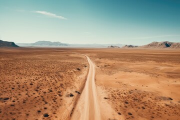 Fototapeta na wymiar empty road in desert landscape on hot day