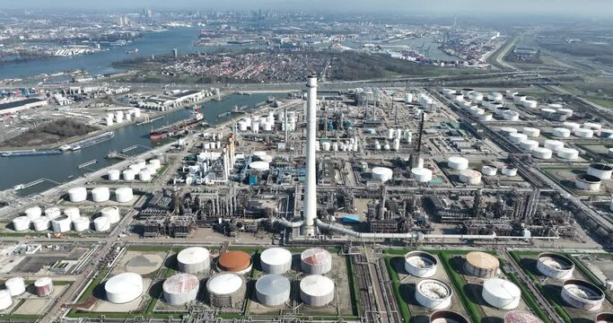 Aerial drone view one of the largest refineries in The Netherlands in the port of Rotterdam, Pernis. Petroleum industry fossil fuels manufacturing and processing.