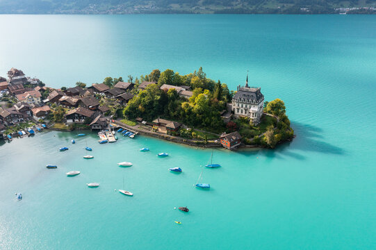 Iseltwald village on a peninsula in lake Brienz in the alps in Canton Bern in Switzerland.