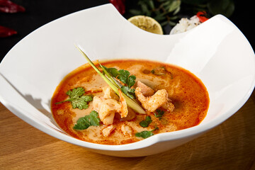Delicious Tom Yum Soup with Seafood and Rice Served in a Modern Bowl - 788216428