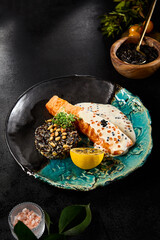 Exquisite Salmon Steak with Caviar Sauce and Brown Rice on Elegant Ceramic Plate - 788216889