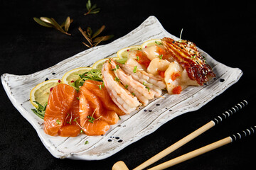 Assorted Sashimi Platter Featuring Salmon, Shrimp, Scallop, and Eel on Elegant Tableware - 788218032