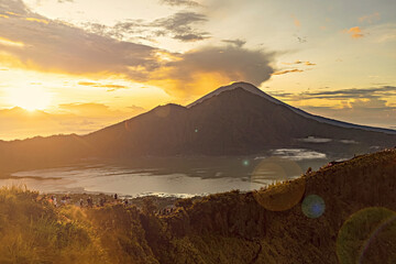 Breathtaking sunrise over Abang mountain, view from Batur volcano and Batur lake, Bali, Indonesia