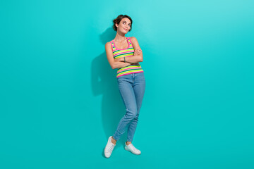 Full body photo of minded stunning lady folded hands look empty space fantasize isolated on teal color background