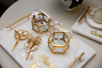 Minimalist wedding ring box set with glass and gold accents