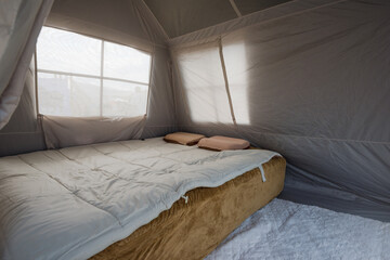 A temporary casual outdoor tent bedroom display