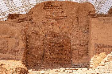 Beautiful stone desert mountain landscape of Israel. Ruins of the old ancient city Dan. Main gate