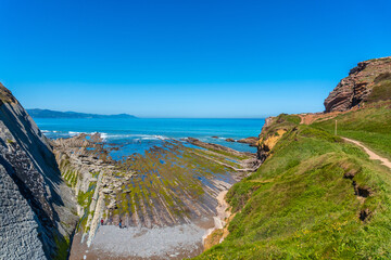 Cala Algorri with a coastal landscape in the flysch of Zumaia without people, Gipuzkoa. Basque...