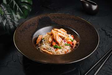 Asian chicken fried rice on elegant plate